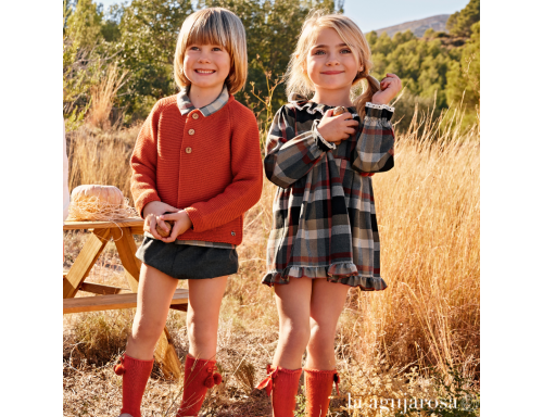 VESTIDO ENTERIZO CUADROS LAZO POMPONES DE LA COLECCIÓN LUCERODE JULAIANA